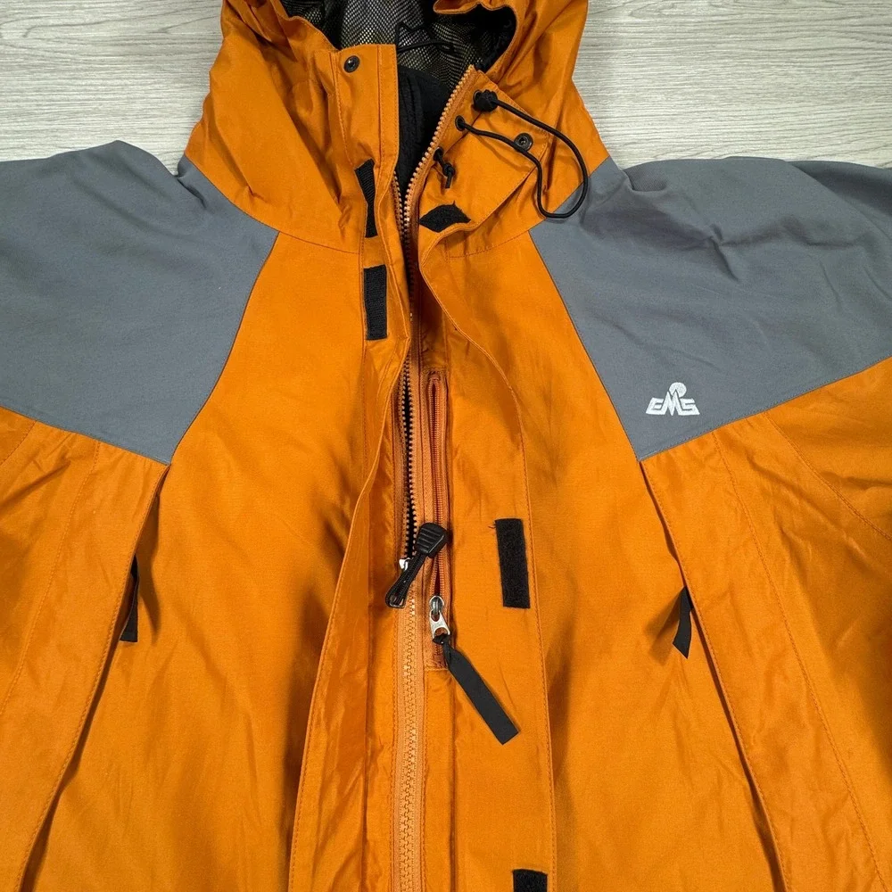 EMS Mens Jacket Gore-Tex Hooded Rain Shell Orange Gray Large Pit Zips Waterproof